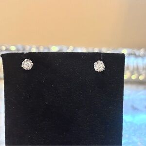 Elegant 10k diamond earrings.25 each